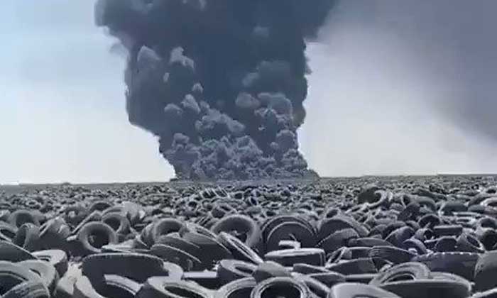 The world’s largest tire graveyard in Kuwait in flames